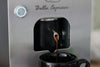 Bella Espresso 12-V-Padmaschine, Espresso läuft in eine schwarze Tasse