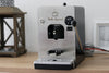 Bella Espresso 12-V-Padmaschine, Vorderansicht mit Spannungsanzeige und Kabel