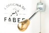 Faber Deluxe E.S.E.-Padmaschine in Weiß/Gold, Detail des Hebels mit goldfarbenem Griff