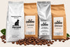 Vier Kilopackungen Celano Kaffee: Nerone Espresso Crema, Classico, Mischung Extra Bar und Speciale, davor geröstete Espressobohnen